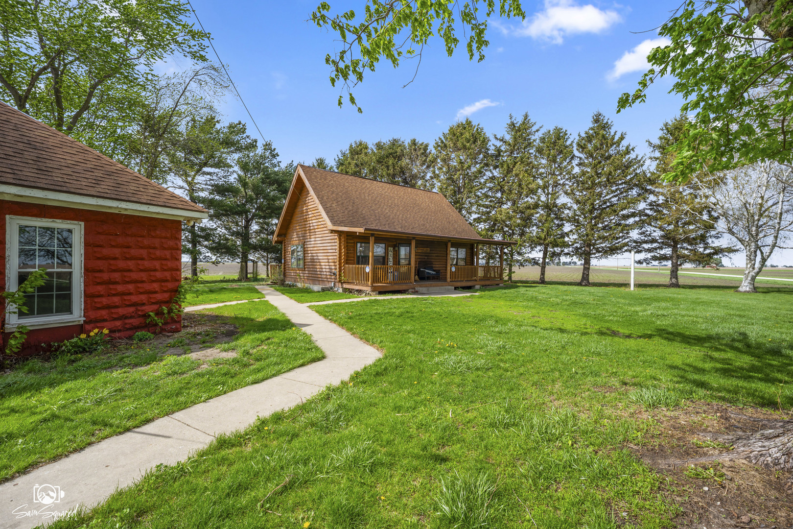 1235 North 1450 East Road Onarga, IL 60955 - Photo 5 of 34 a front view of a house with a yard
