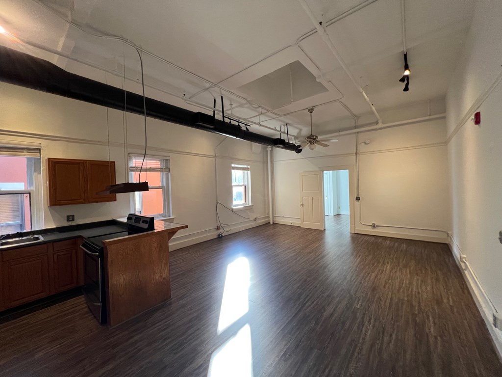 1106 Broadway, Unit 1106C Columbus, GA 31901 - Photo 4 of 22 Living area and partial kitchen view