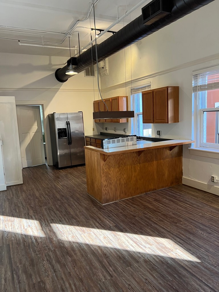1106 Broadway, Unit 1106C Columbus, GA 31901 - Photo 8 of 22 Kitchen from living area