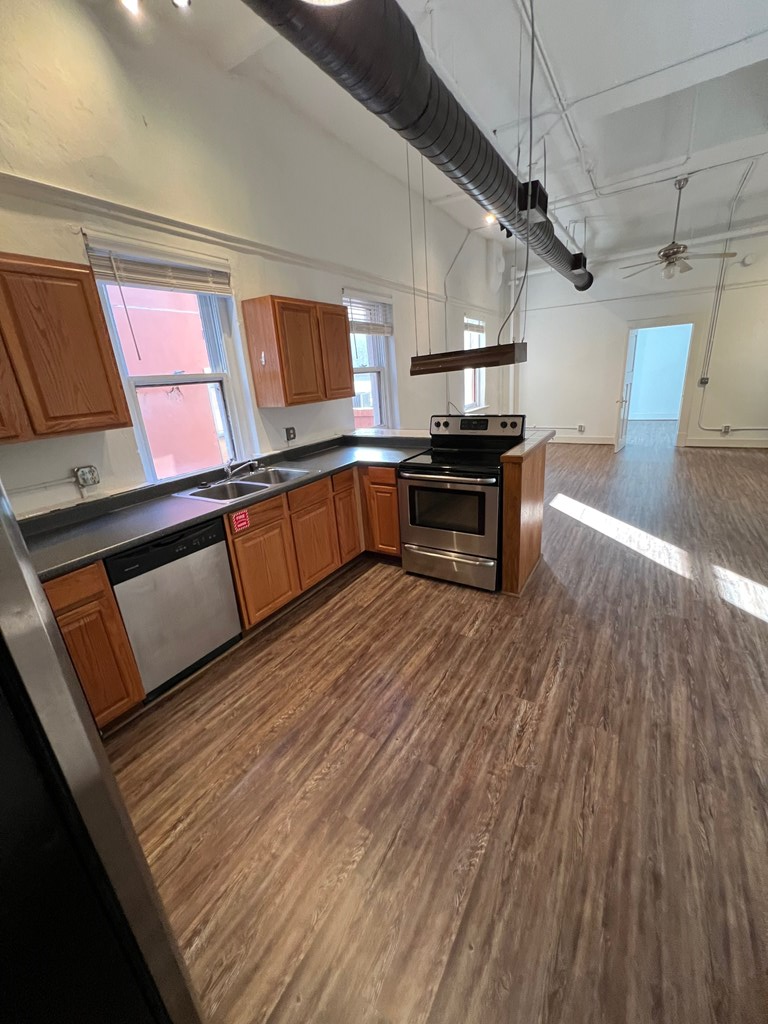 1106 Broadway, Unit 1106C Columbus, GA 31901 - Photo 9 of 22 Kitchen looking toward living area