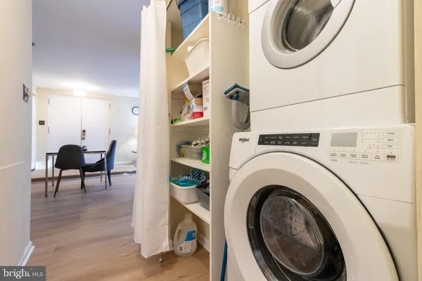 a view of a storage & utility room with washer and dryer