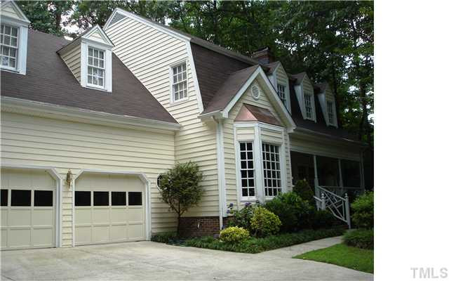 5505 North Hawthorne Way Raleigh, NC 27613 - Photo 1 of 12 Lush greenery and professional landscaping are a few of the features that make this house stand out. The front porch is welcoming you to relax with a mint julep! Facade/Exterior Front