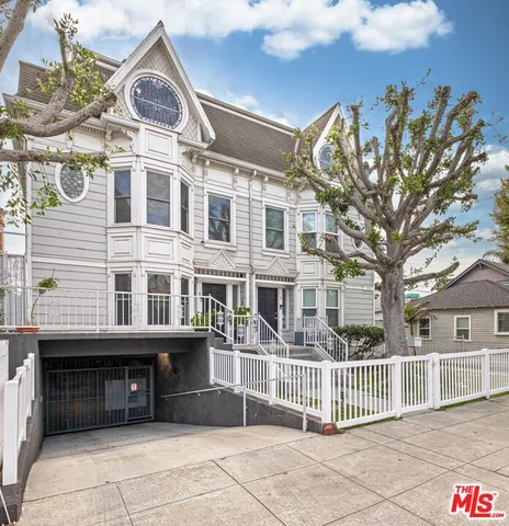 a front view of a house with a garage