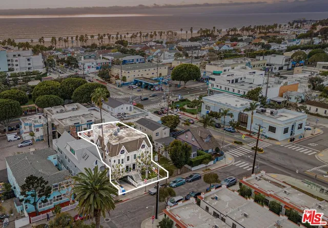 an aerial view of a city with lots of residential buildings