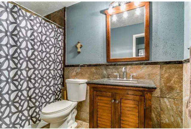 a bathroom with a sink and a toilet