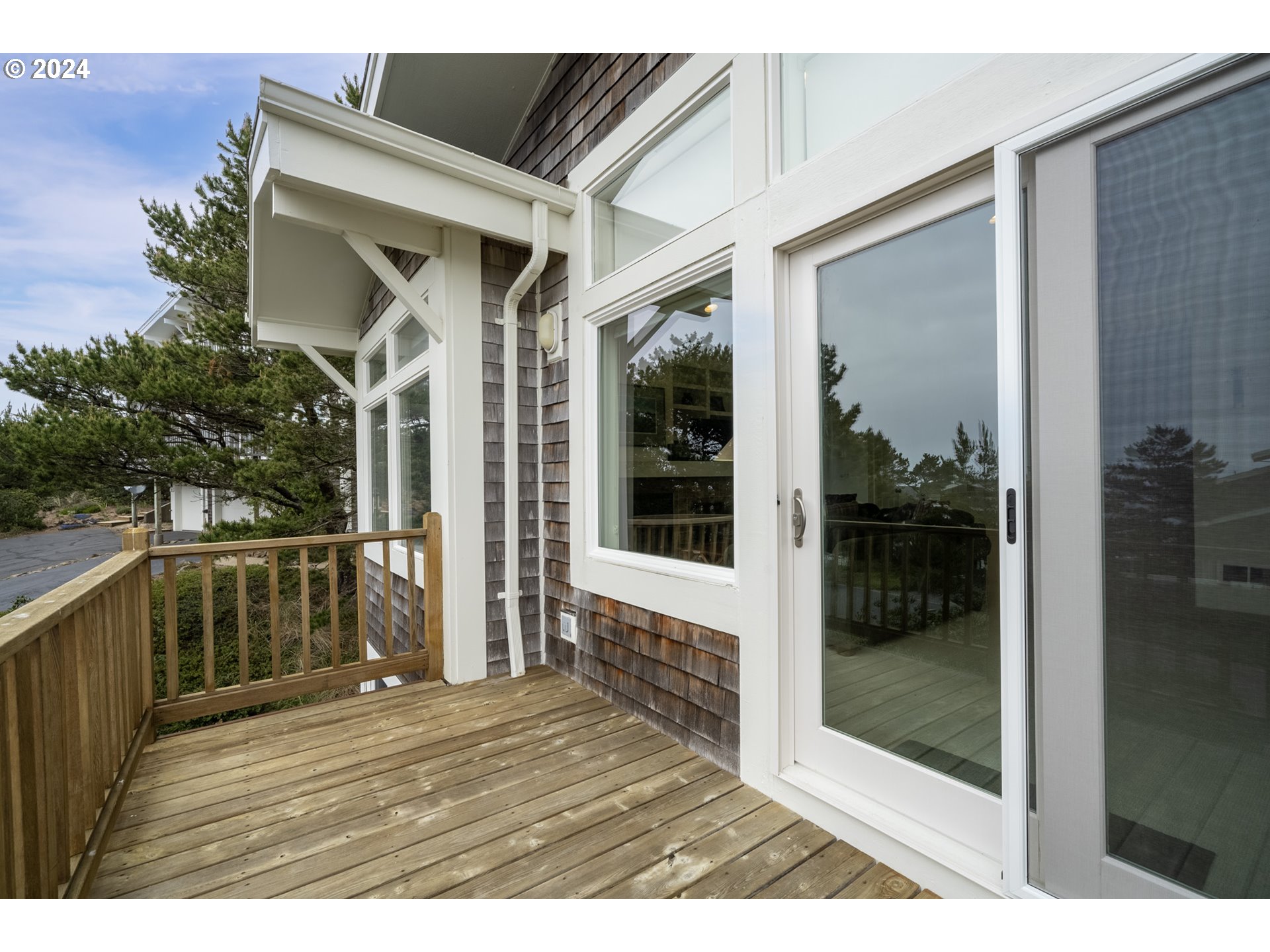 250 Capes Drive Oceanside, OR 97141 - Photo 17 of 38 a view of a porch