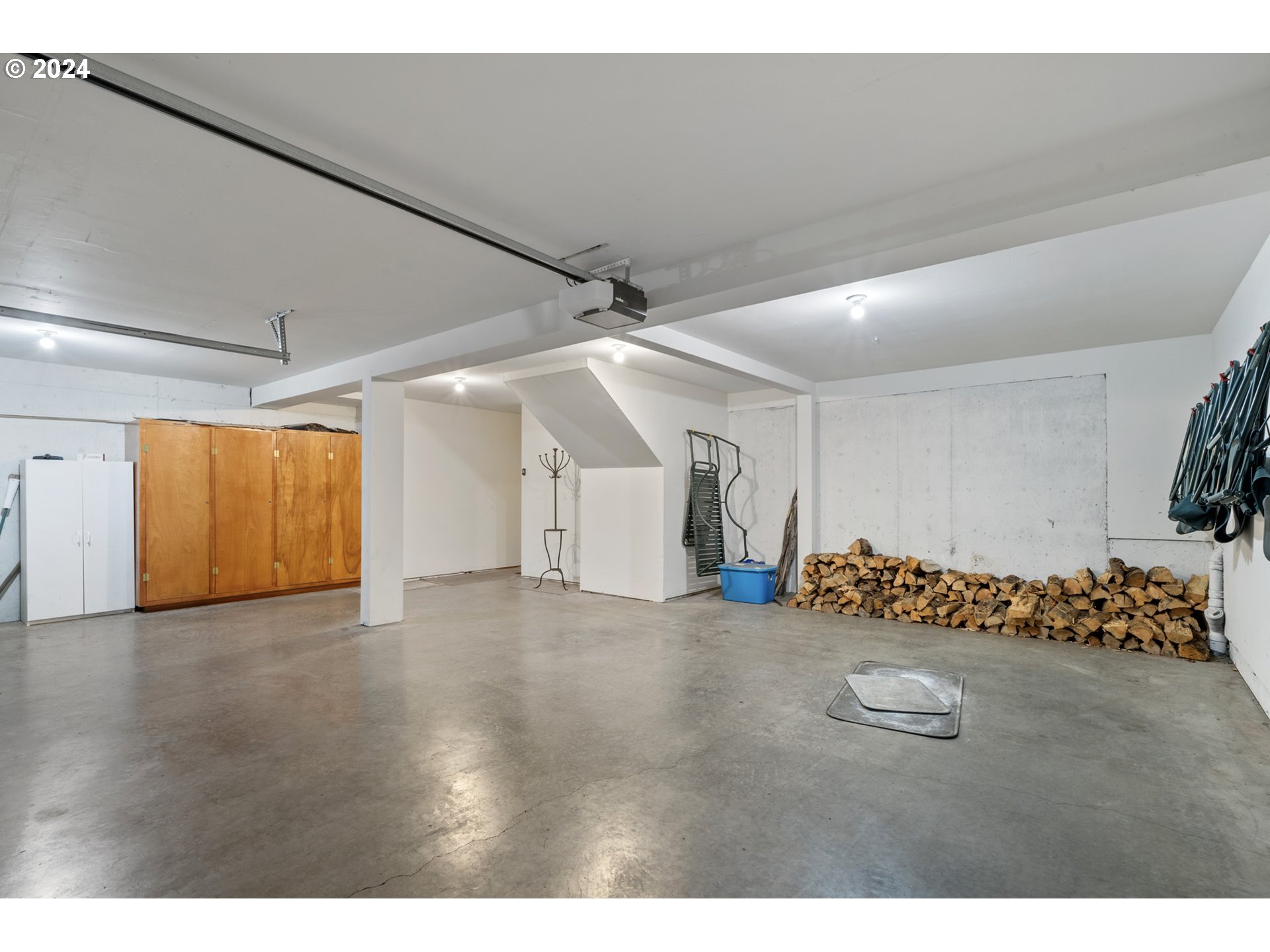 250 Capes Drive Oceanside, OR 97141 - Photo 29 of 38 a view of a room with wooden floor