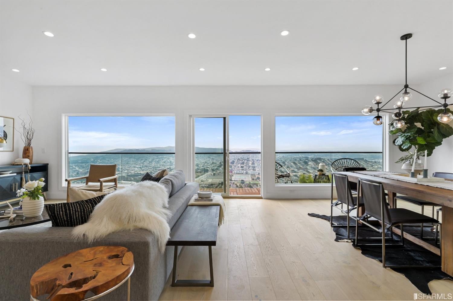 464 Lansdale Avenue San Francisco, CA 94127 - Photo 11 of 61 a living room with furniture a floor to ceiling window and a table