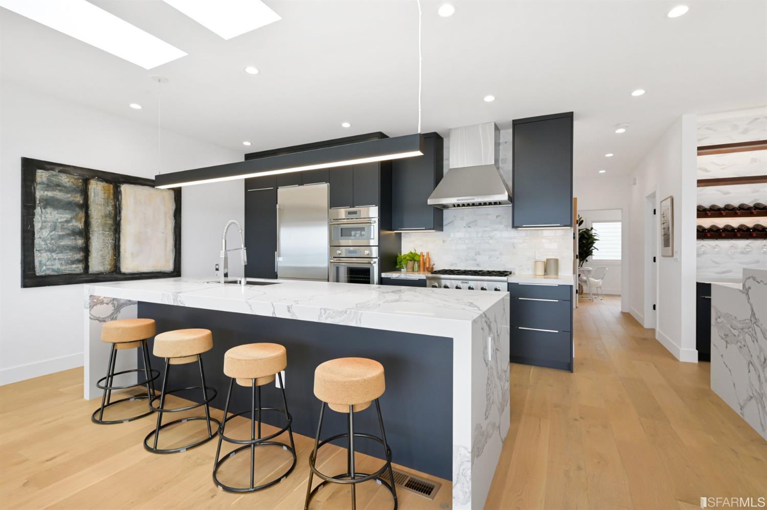 464 Lansdale Avenue San Francisco, CA 94127 - Photo 21 of 61 a kitchen with stainless steel appliances granite countertop a stove a sink and a refrigerator