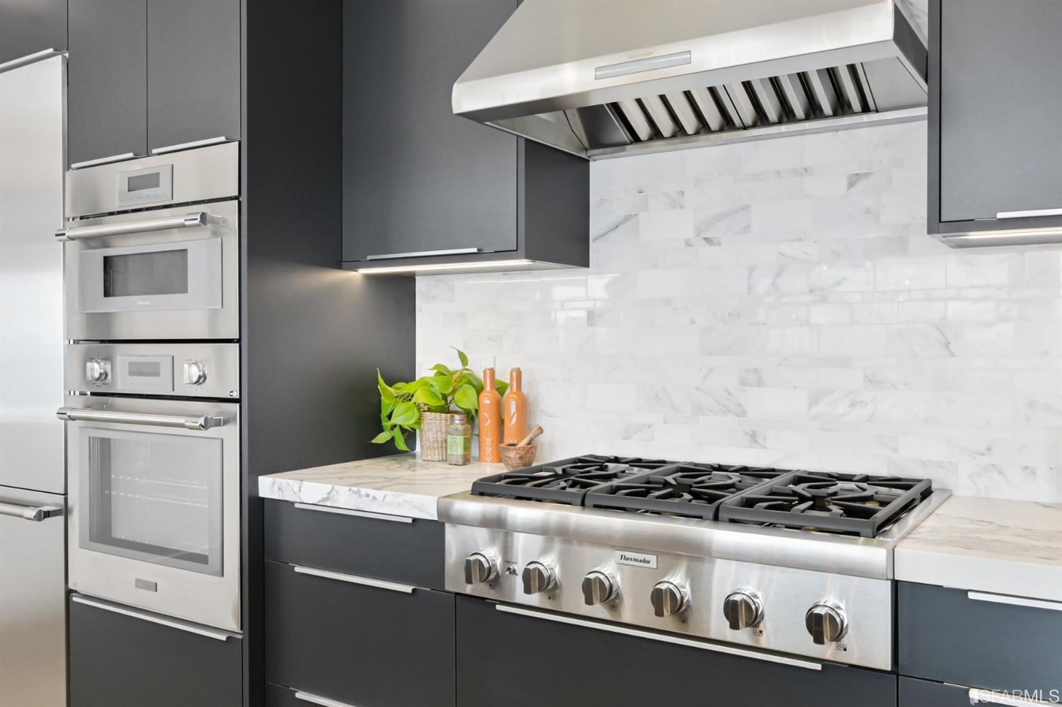 464 Lansdale Avenue San Francisco, CA 94127 - Photo 25 of 61 a stove top oven sitting inside of a kitchen