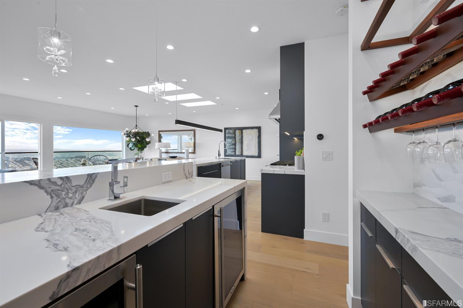 464 Lansdale Avenue San Francisco, CA 94127 - Photo 27 of 61 a kitchen with stainless steel appliances granite countertop a sink a oven and a refrigerator