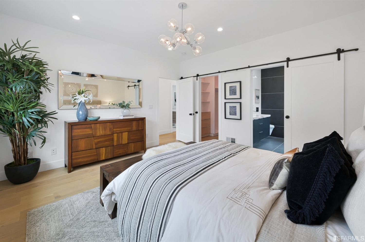 464 Lansdale Avenue San Francisco, CA 94127 - Photo 30 of 61 a bedroom with a bed and a potted plant