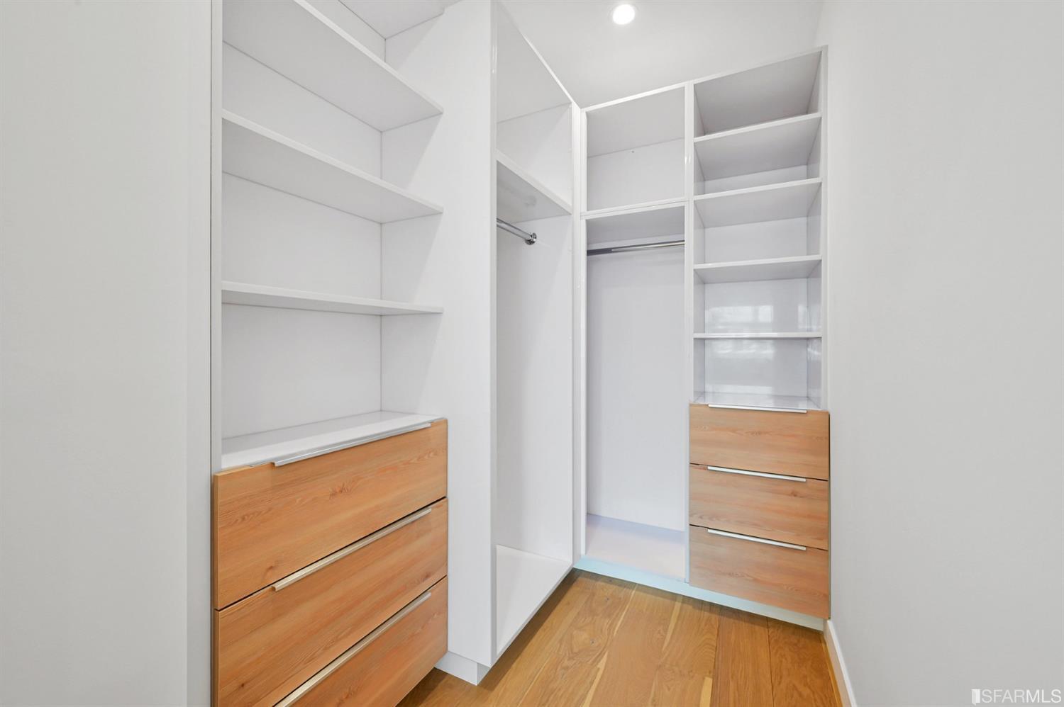464 Lansdale Avenue San Francisco, CA 94127 - Photo 31 of 61 a view of walk in closet with empty racks