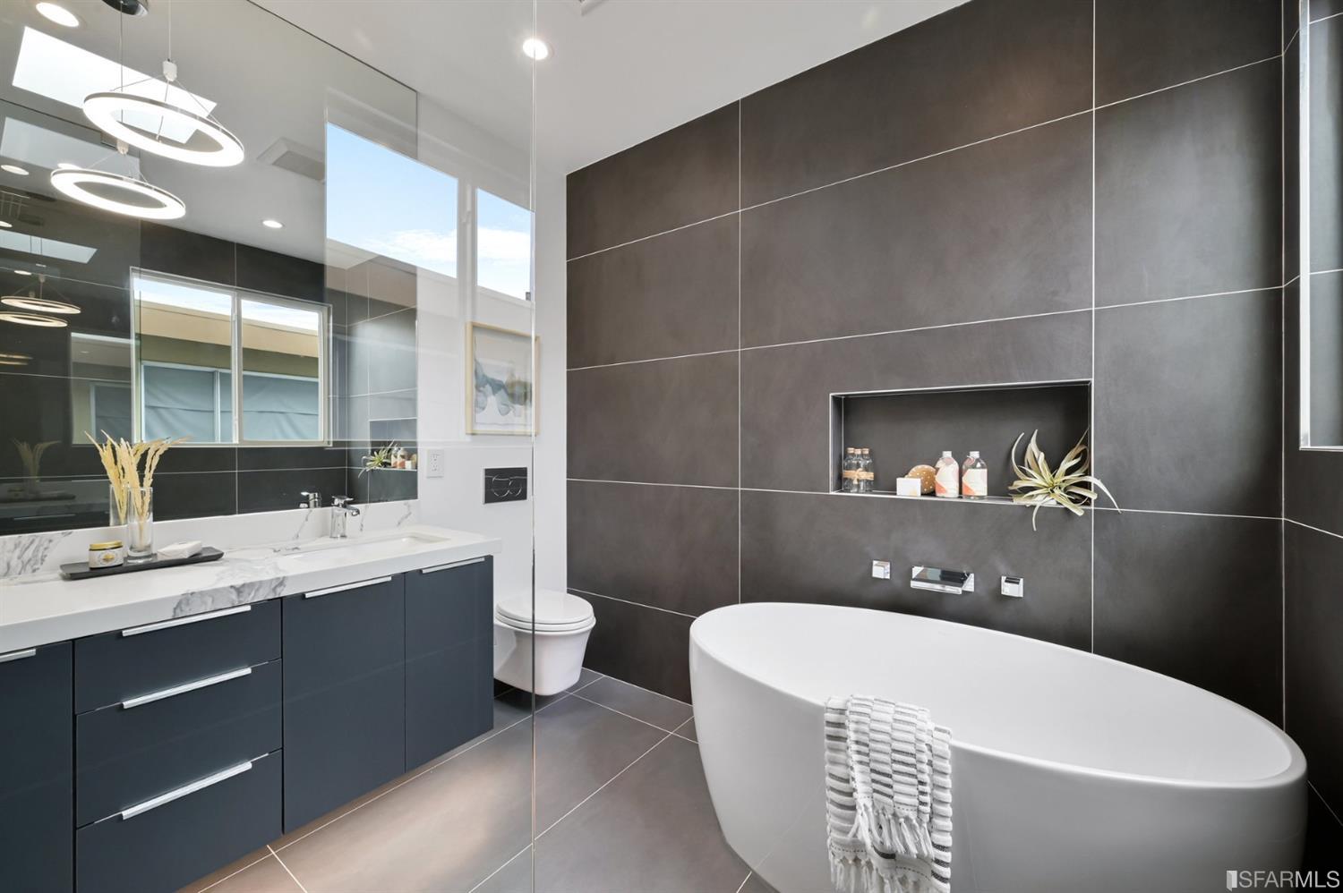 464 Lansdale Avenue San Francisco, CA 94127 - Photo 34 of 61 a bathroom with a sink a toilet and shower