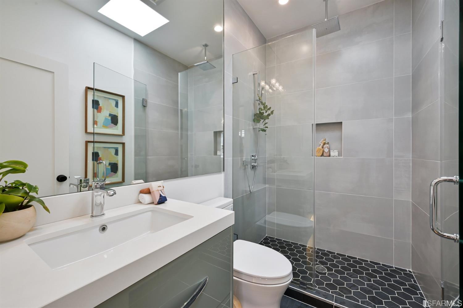 464 Lansdale Avenue San Francisco, CA 94127 - Photo 38 of 61 a bathroom with a sink a toilet and shower