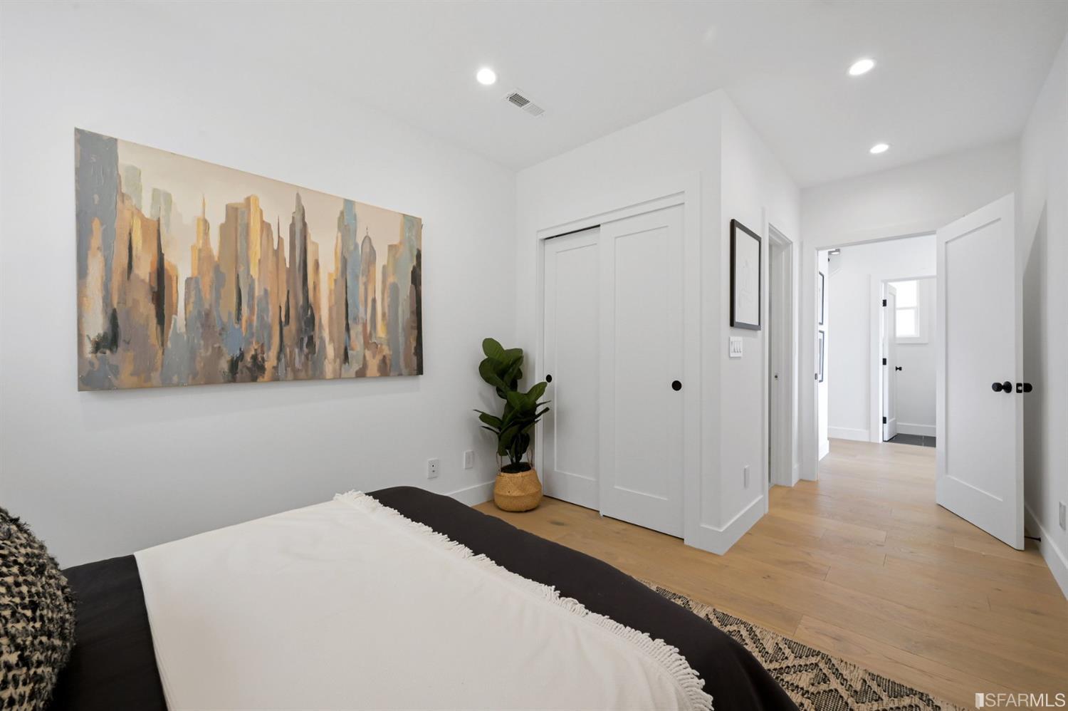 464 Lansdale Avenue San Francisco, CA 94127 - Photo 40 of 61 a bedroom with a bed and a potted plant