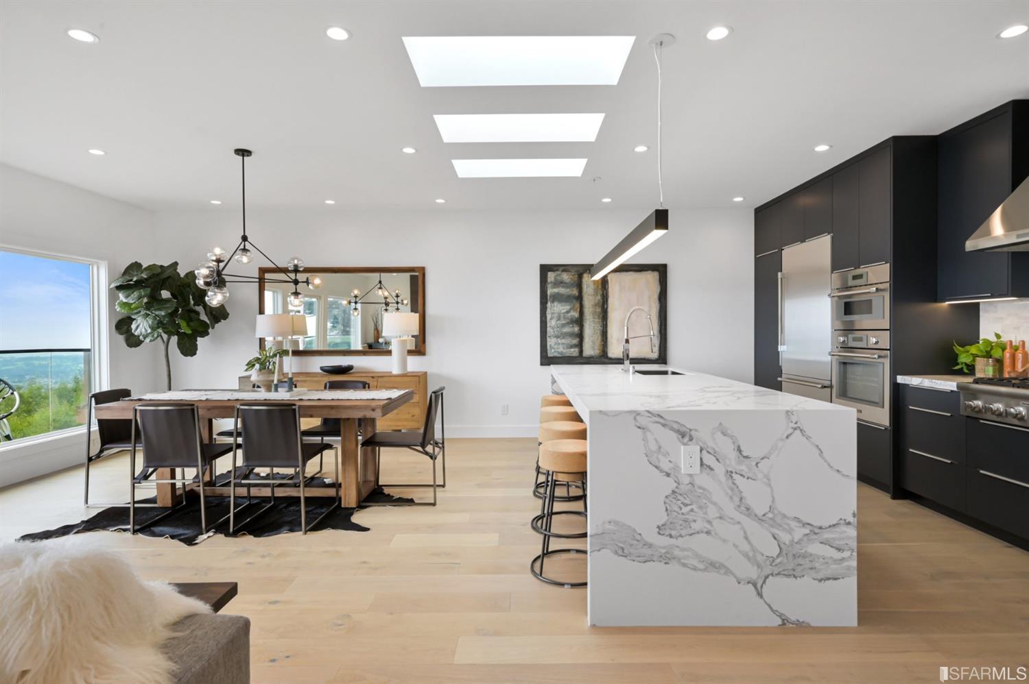 464 Lansdale Avenue San Francisco, CA 94127 - Photo 10 of 61 a living room with furniture a dining table and kitchen view