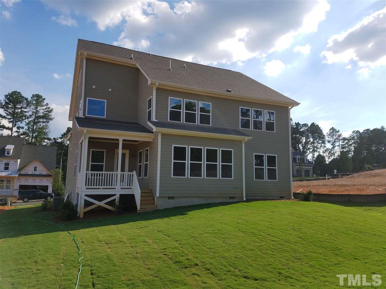 5264 Aleppo Lane, Unit 51 Raleigh, NC 27613 - Photo 2 of 22 a view of a house with a garden