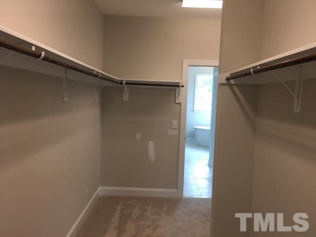 5264 Aleppo Lane, Unit 51 Raleigh, NC 27613 - Photo 17 of 22 a view of walk in closet