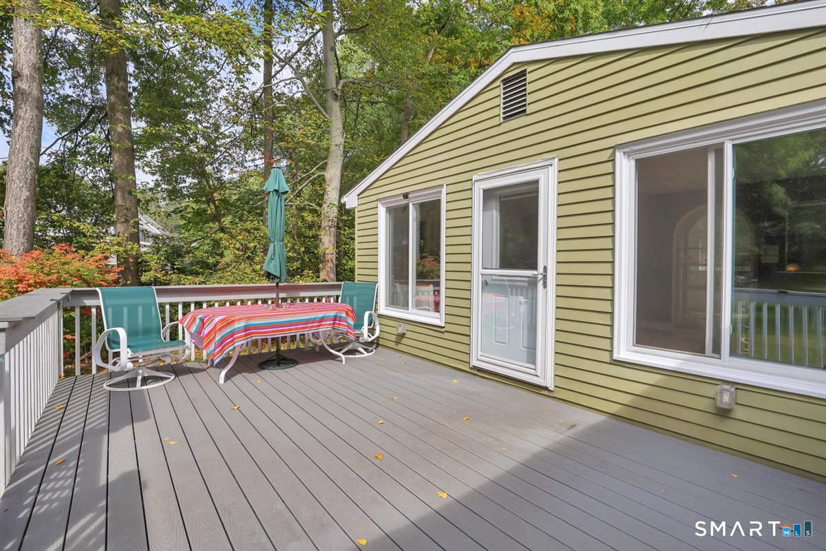 21 Silversmith Road Farmington, CT 06085 - Photo 24 of 30 Step outside from the sunroom to the Trex deck