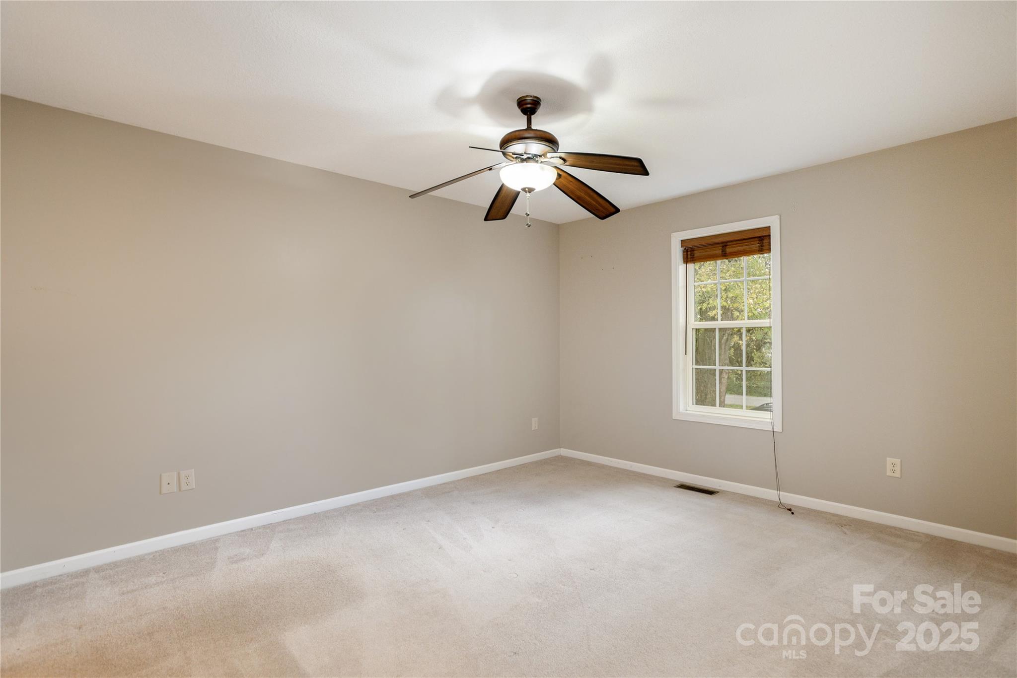 190 Temple Church Road Brevard, NC 28712 - Photo 13 of 24 a view of room with ceiling fan and window