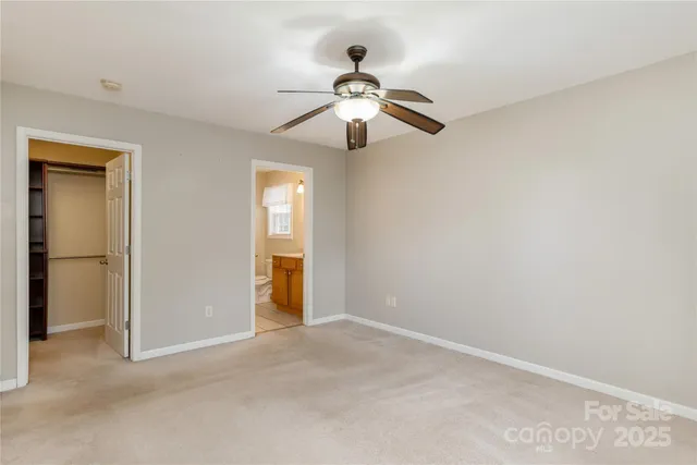 a view of a chandelier fan in a room