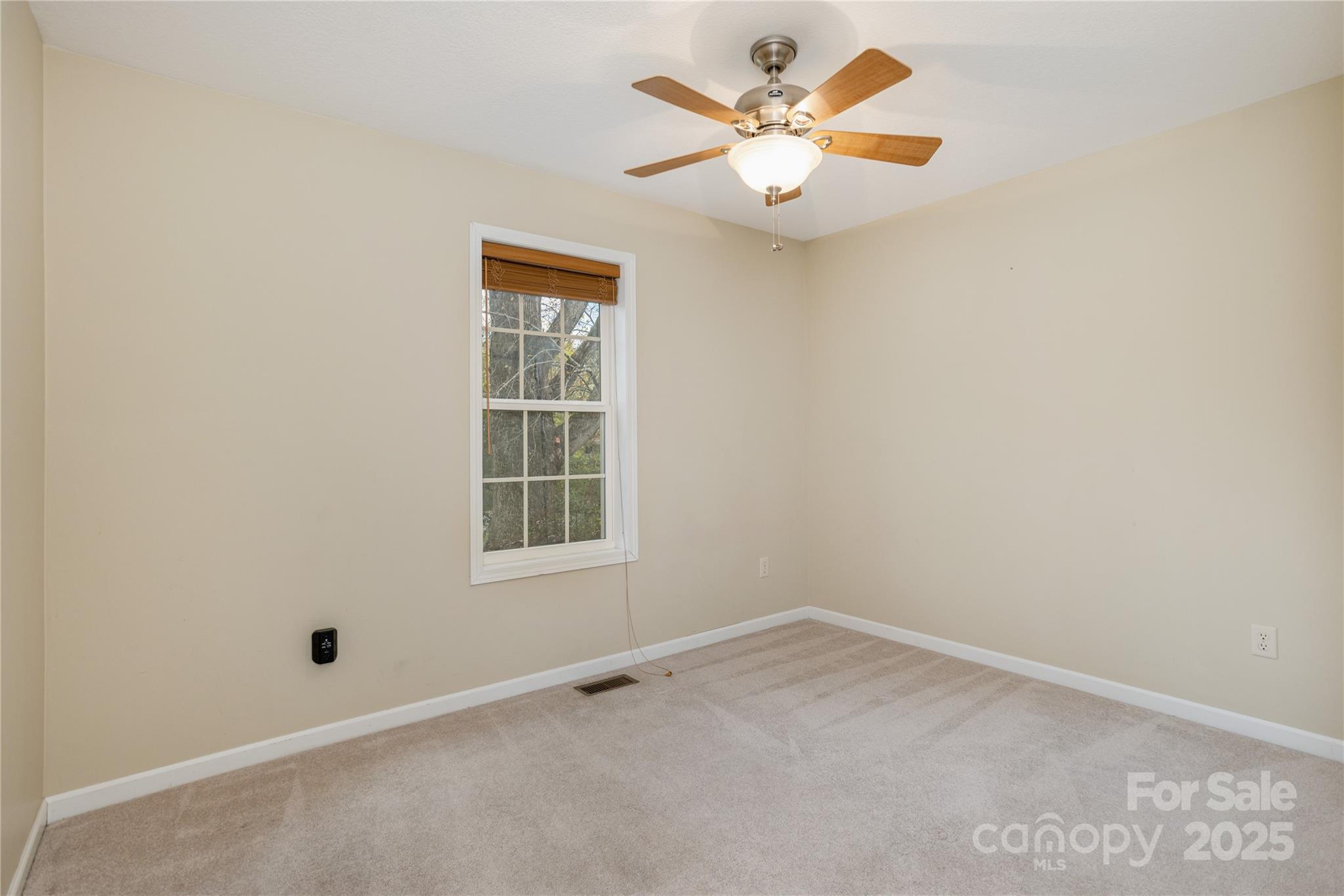 190 Temple Church Road Brevard, NC 28712 - Photo 17 of 24 an empty room with a window