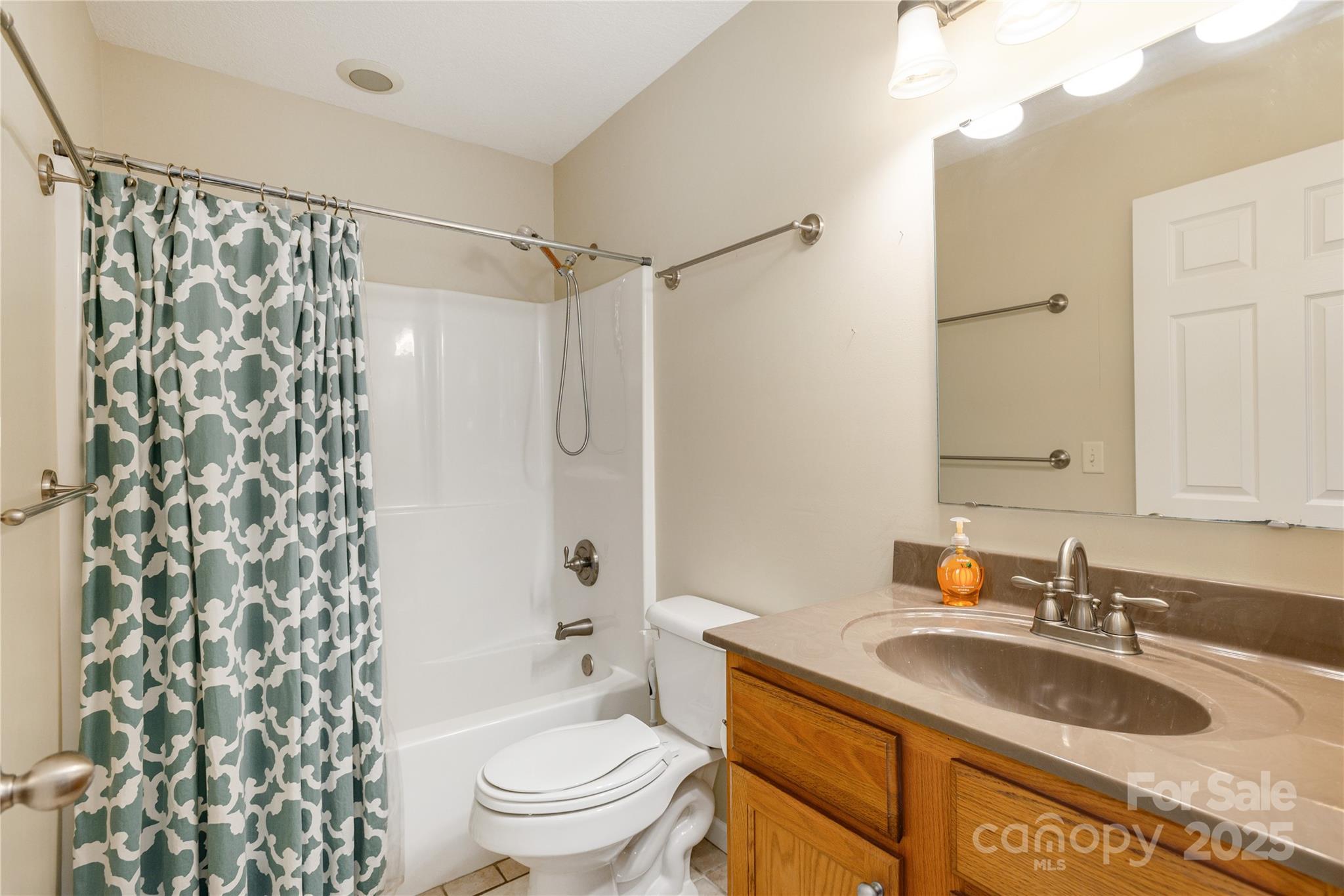 190 Temple Church Road Brevard, NC 28712 - Photo 18 of 24 a bathroom with a granite countertop sink toilet and shower