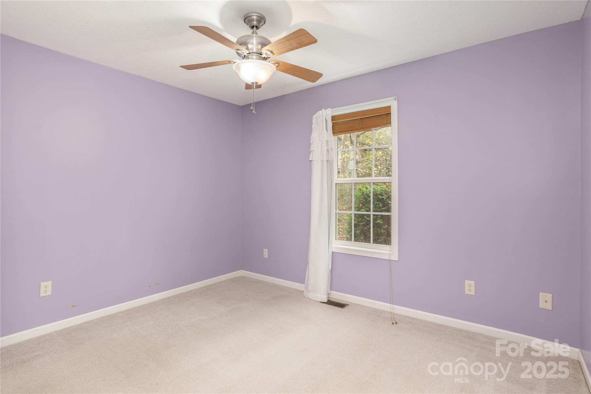 190 Temple Church Road Brevard, NC 28712 - Photo 19 of 24 an empty room with a window