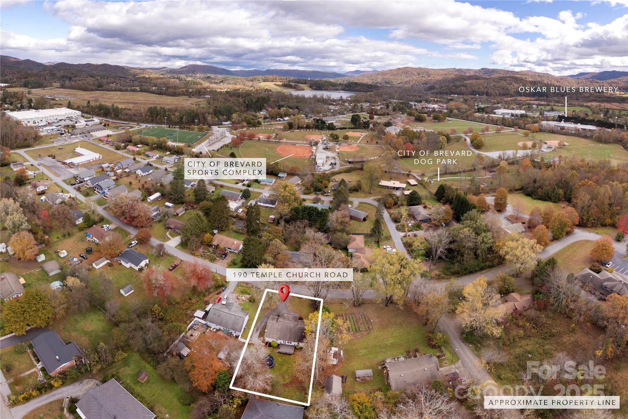 190 Temple Church Road Brevard, NC 28712 - Photo 23 of 24 an aerial view of residential houses with city view