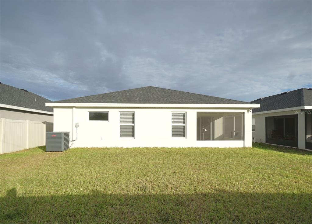 12221 Cypress Br Street Riverview, FL 33579 - Photo 20 of 20 a large white house with yard in front of it