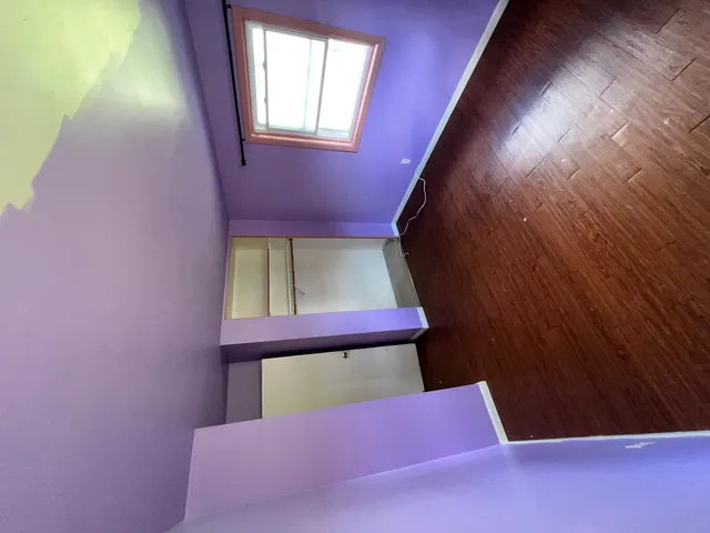 a kitchen with granite countertop a sink stainless steel appliances and cabinets