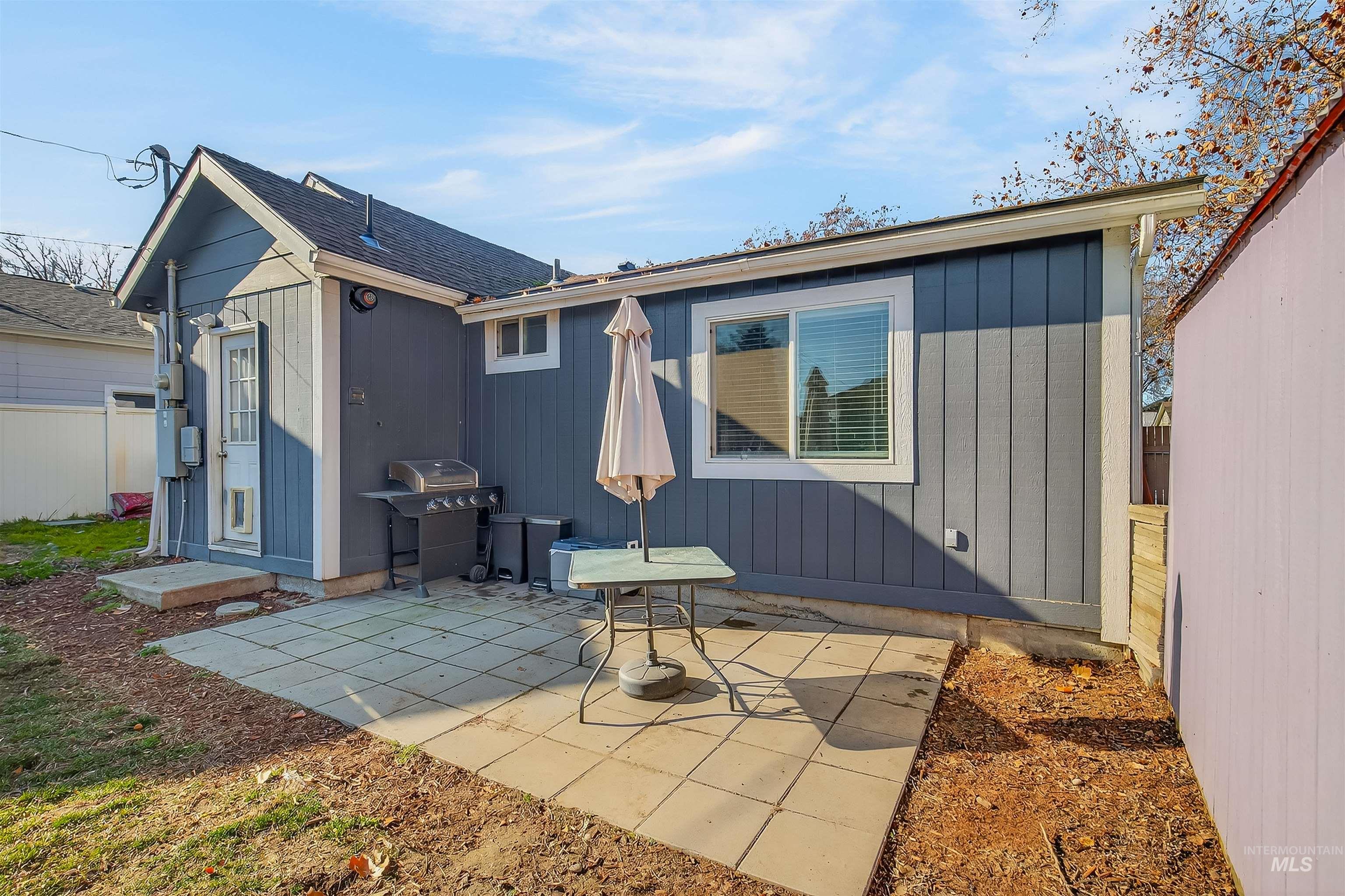 807 3rd Street Clarkston, WA 99403 - Photo 26 of 33 Rear view of house featuring a patio and a shingled roof