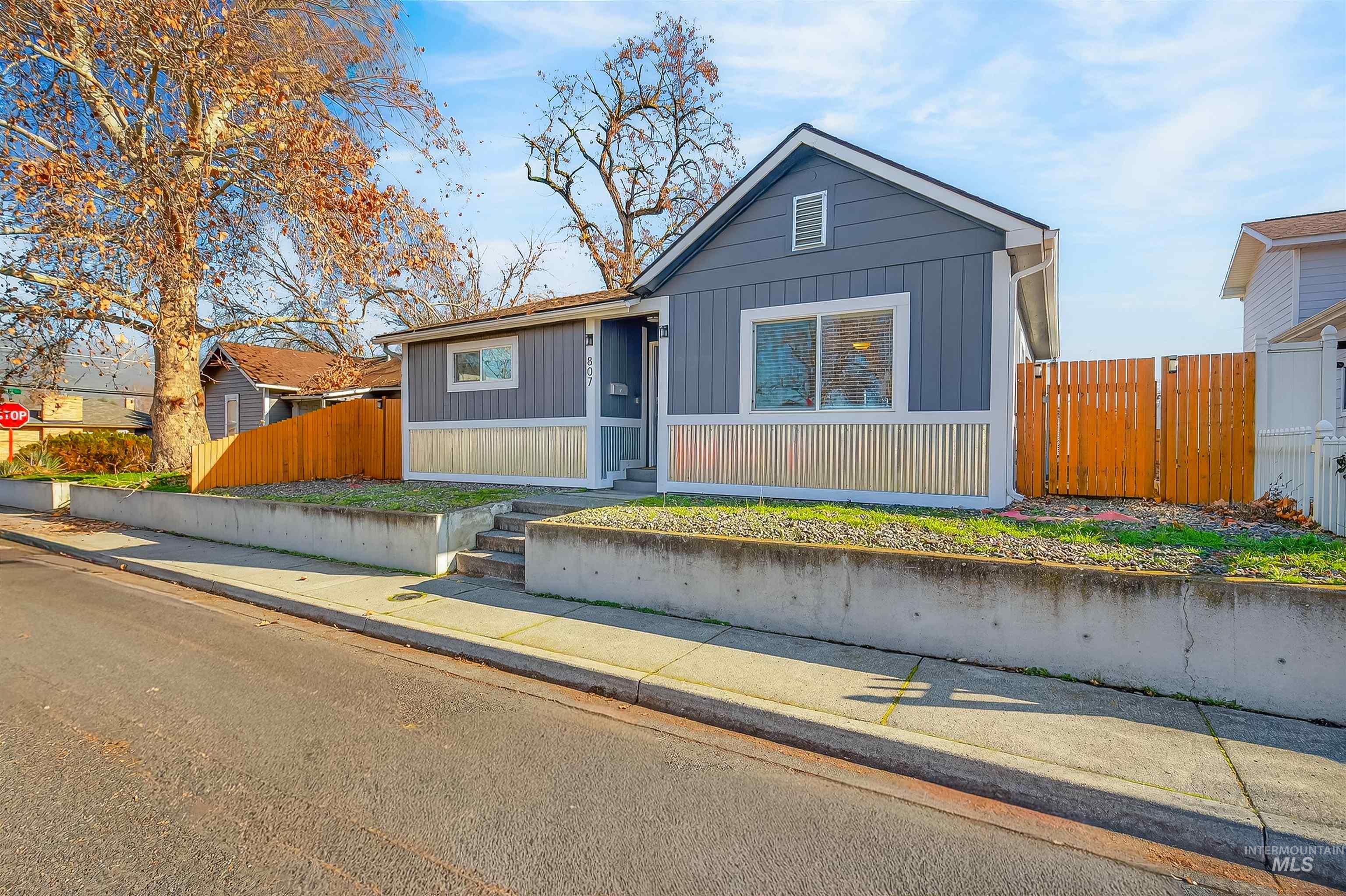 807 3rd Street Clarkston, WA 99403 - Photo 3 of 33 View of front facade featuring board and batten siding