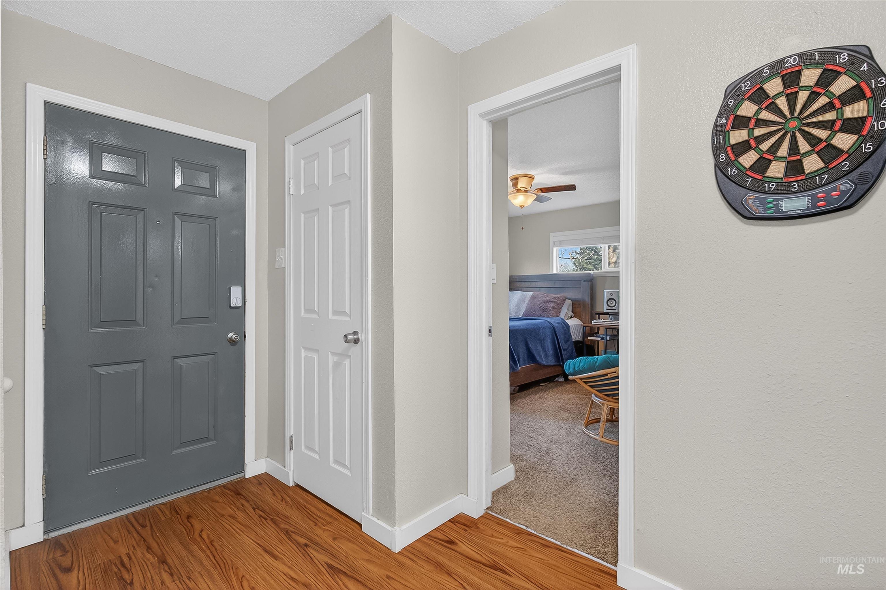 807 3rd Street Clarkston, WA 99403 - Photo 5 of 33 Foyer with light wood finished floors and a ceiling fan