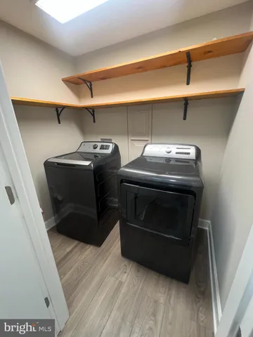 a utility room with washer and dryer