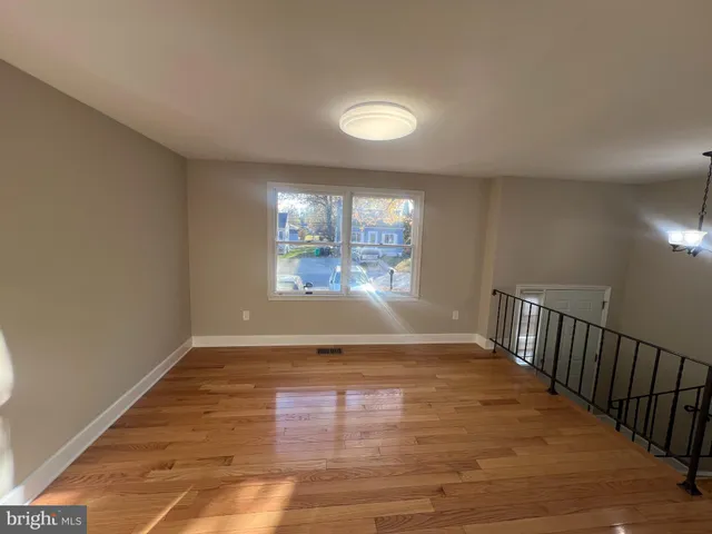 a view of livingroom with wooden floor