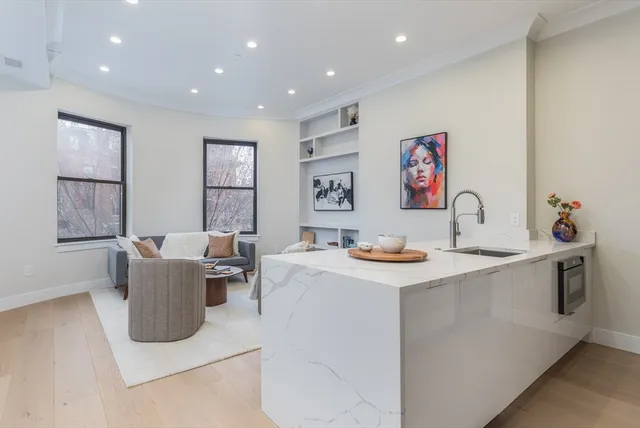 a living room with furniture and window