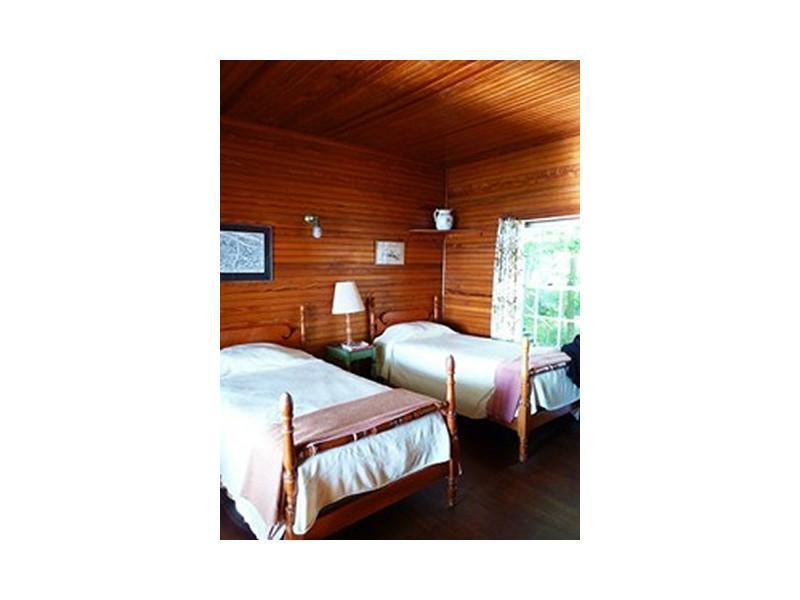 80 Lake Drive Rome, ME 04963 - Photo 11 of 35 Bedroom. Charming bedroom with wood...