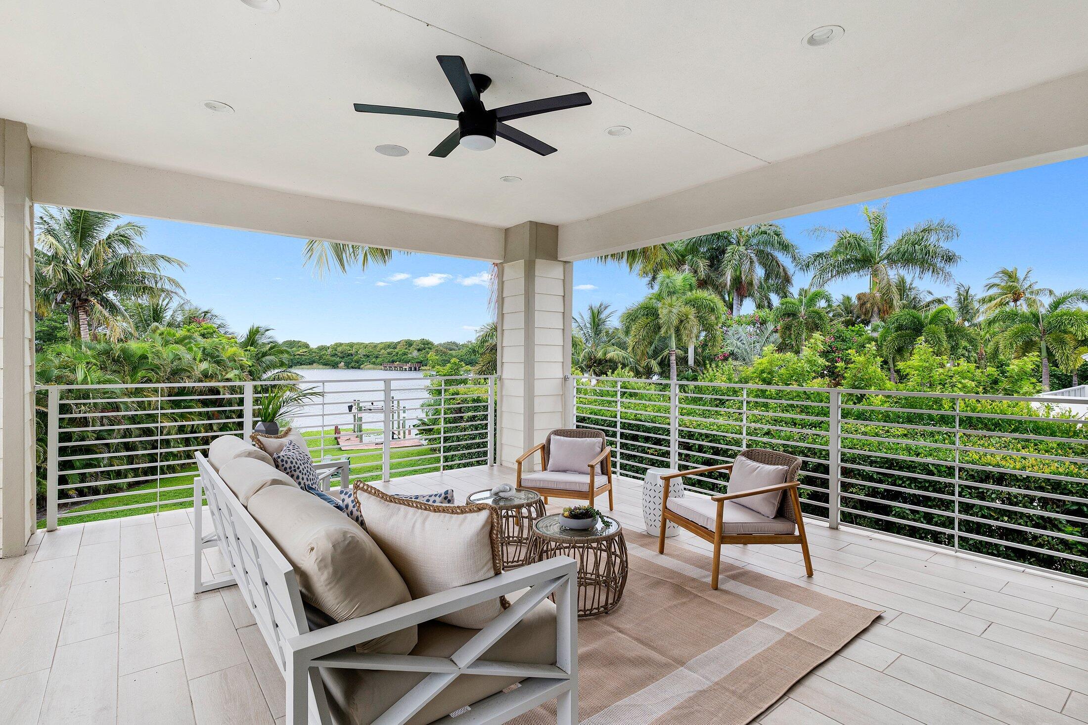 1400 Lake Drive Delray Beach, FL 33444 - Photo 115 of 121 a view of a chairs and table in patio