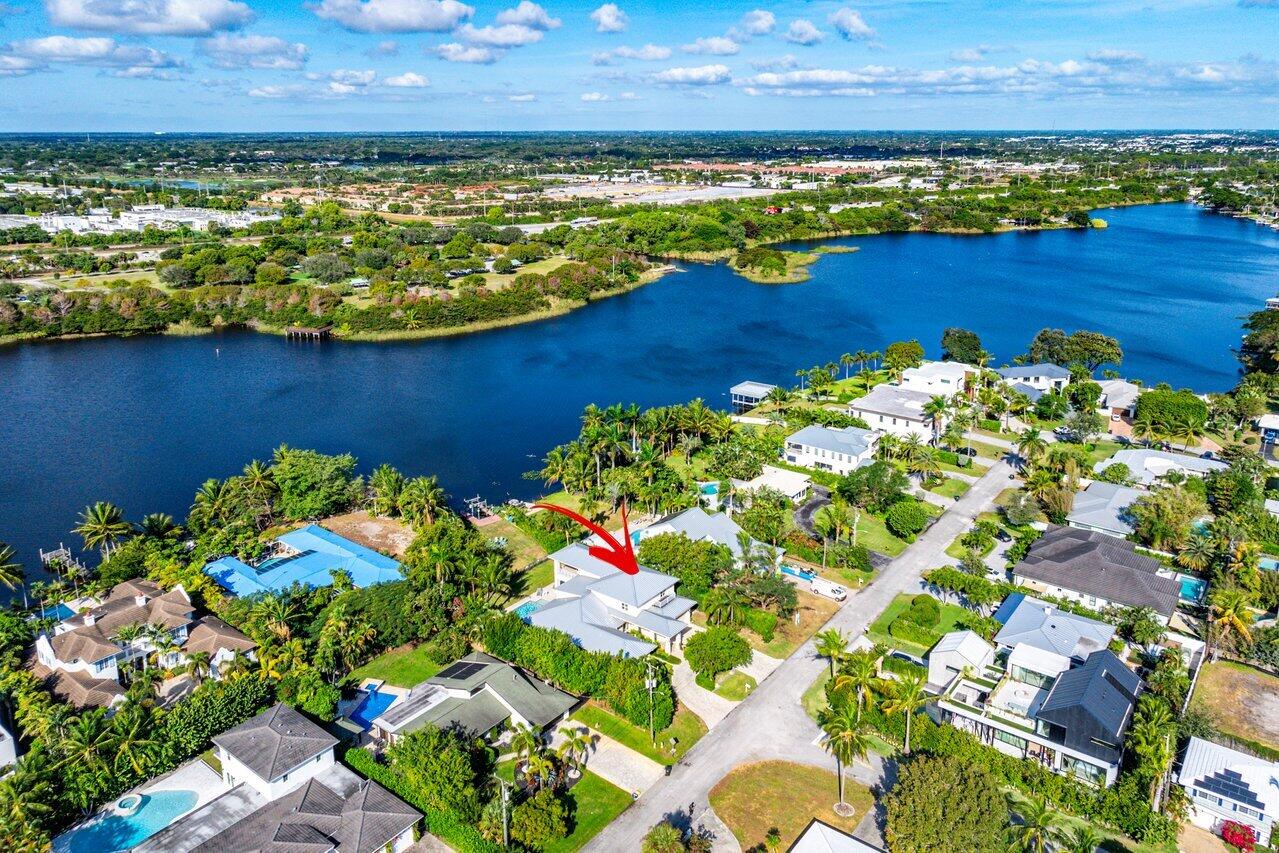 1400 Lake Drive Delray Beach, FL 33444 - Photo 67 of 121 a view of a lake with a building in the background