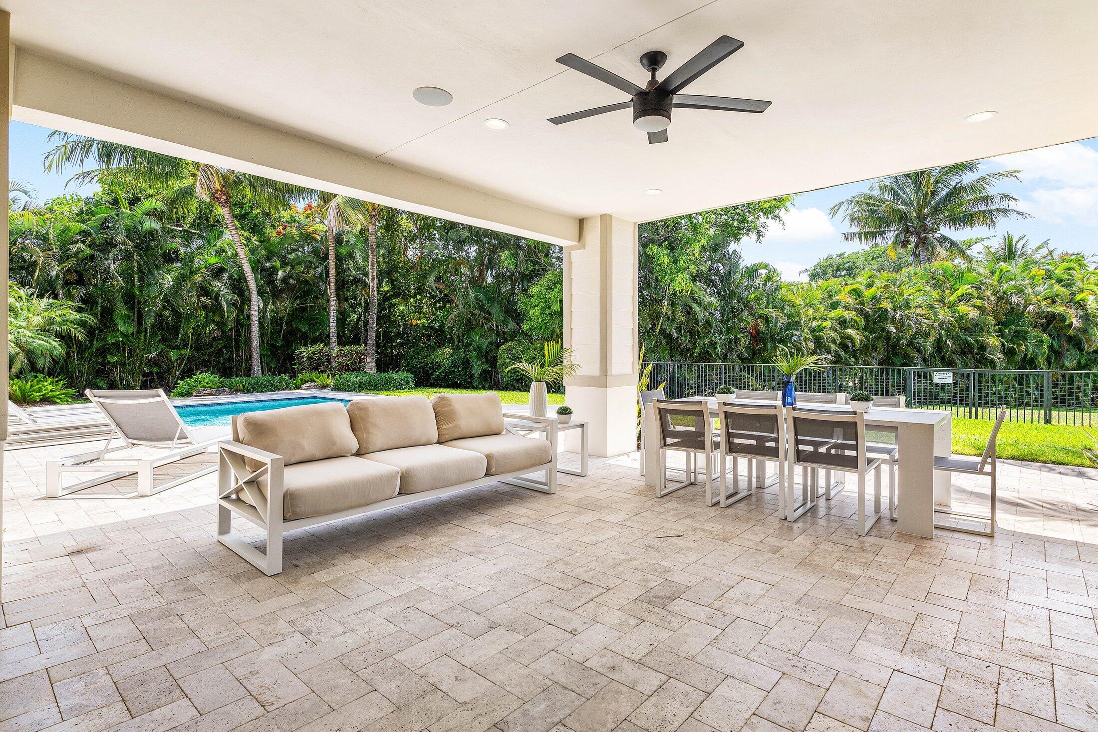1400 Lake Drive Delray Beach, FL 33444 - Photo 88 of 121 a view of a patio with couches and pool