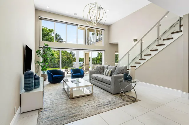 a bedroom with a bed and flat screen tv