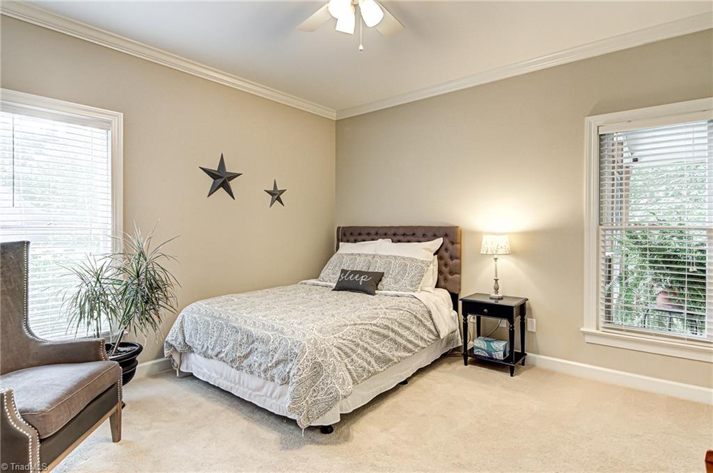 3835 Edgewater Street High Point, NC 27265 - Photo 17 of 30 Bedroom 2 is located on the main level and can be used as an additional flex space as well as a guest room. There is also a full bath with a tub and shower combination on the main level.