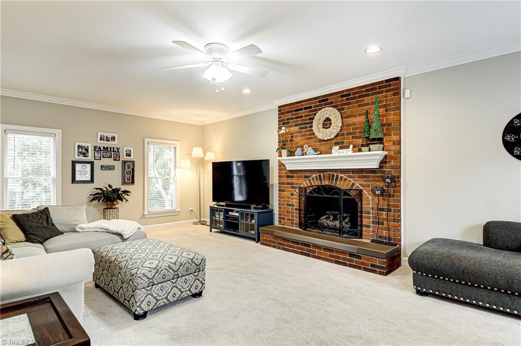 3835 Edgewater Street High Point, NC 27265 - Photo 5 of 30 The great room is bright with natural light and sized to meet all of your furniture needs. The brick fireplace with gas logs adds a cozy spot to gather with your family.