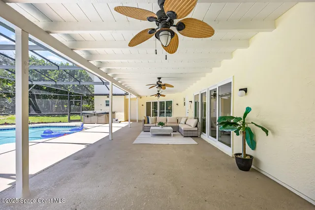 a view of an entryway with a floor to ceiling window