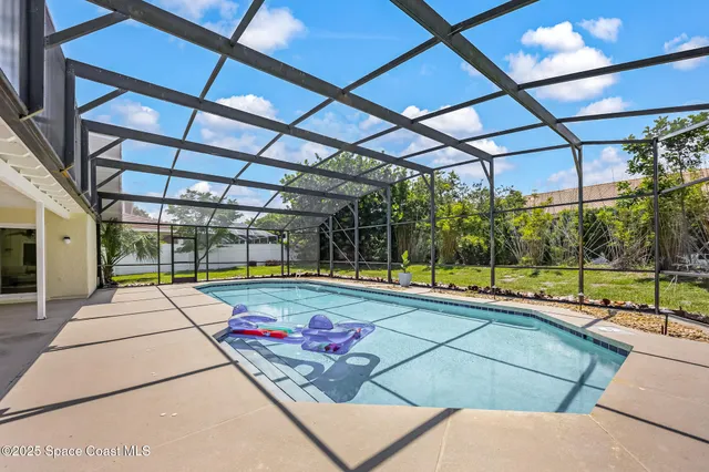 a view of a swimming pool with a porch