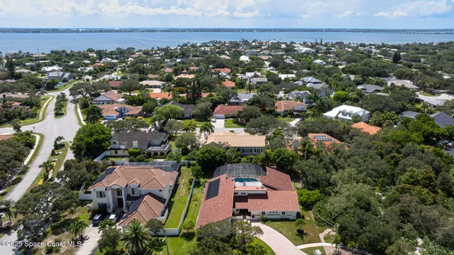 an aerial view of a city with lots of residential buildings