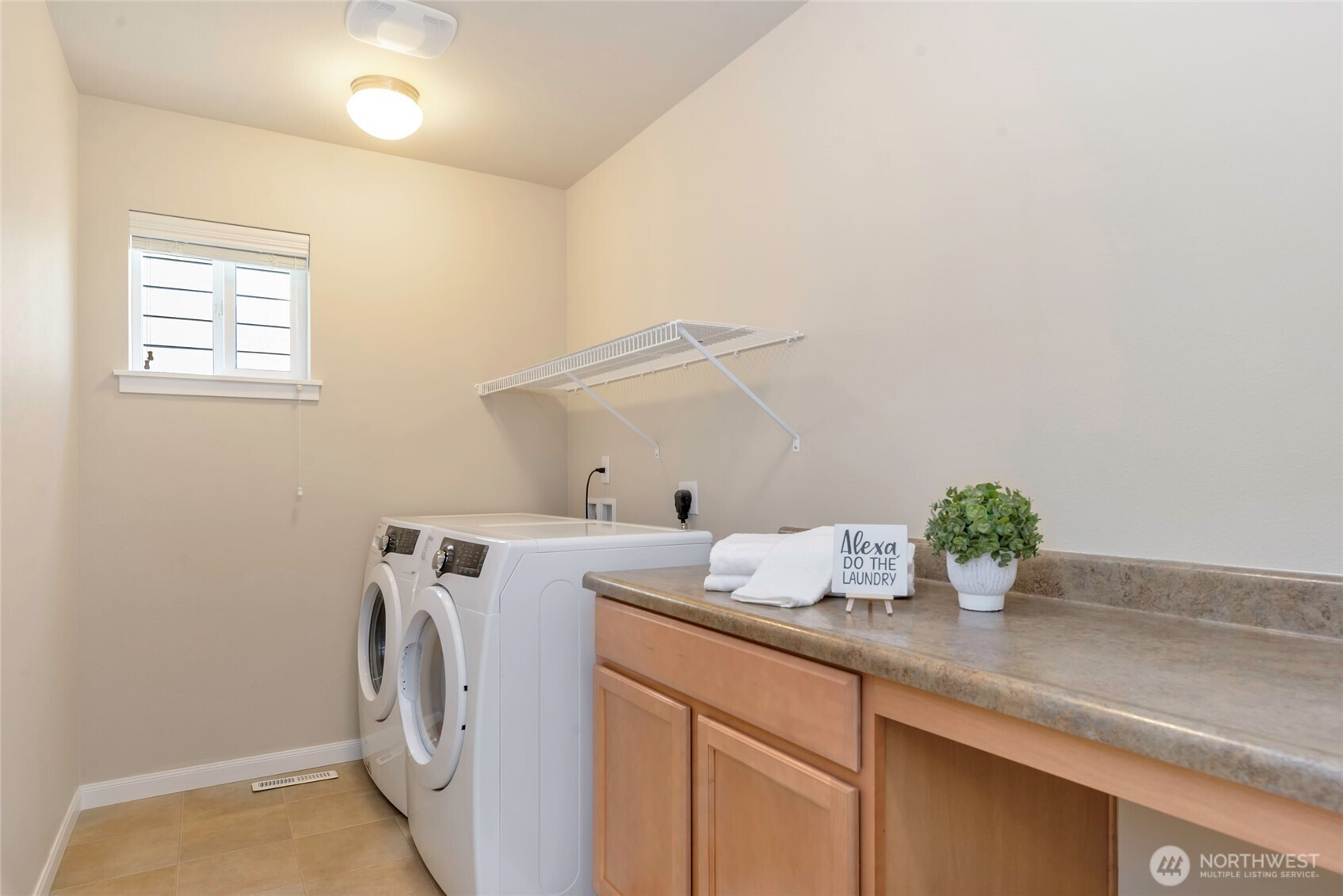 11290 Borgen Loop Northwest Gig Harbor, WA 98332 - Photo 22 of 26 a utility room with dryer and washer