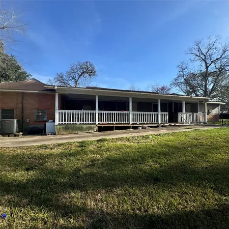 a house view with a garden space